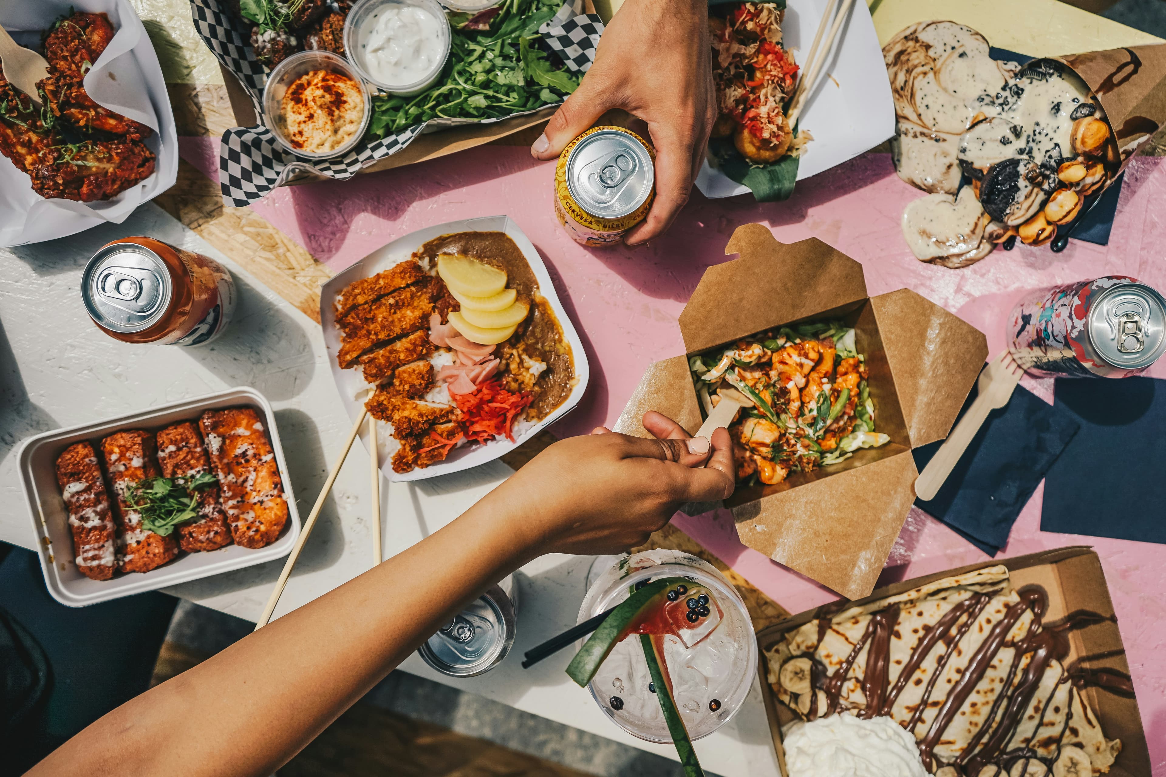 Friends sharing a table of food